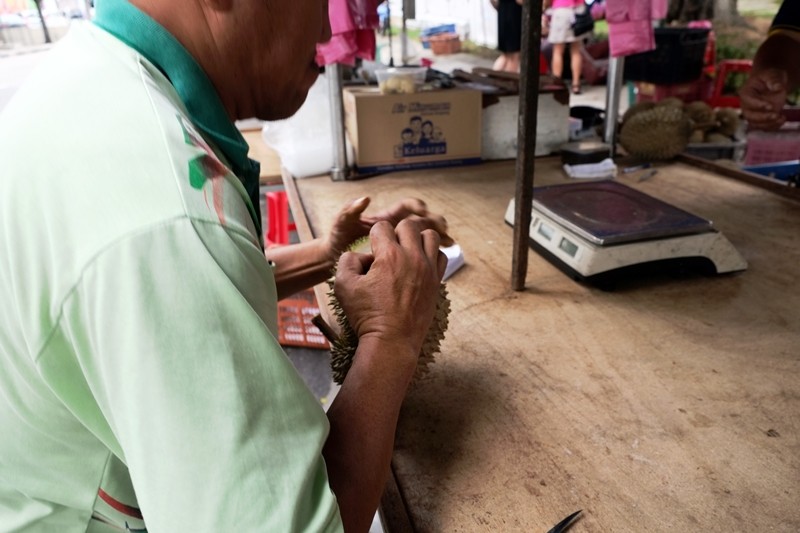 Opening the durian, Penang
